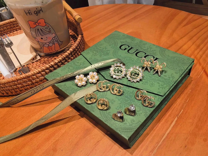 GUCCI GG Supreme Earrings