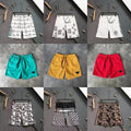 Dior Oblique, Prada Triangle, Fendi FF, and Gucci Print Shorts